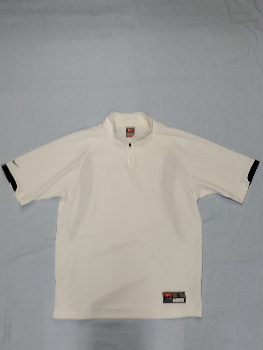 Nike White Short-Sleeve Quarter-Zip Polo with Black Cuff Accents